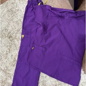 Women’s size medium, regular length, “Wonder wink-4 stretch” scrubs. Smoke free